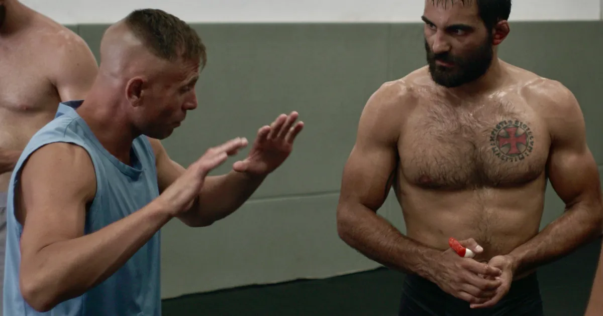 Christophe Savoca explaining grappling to Benoît Saint Denis